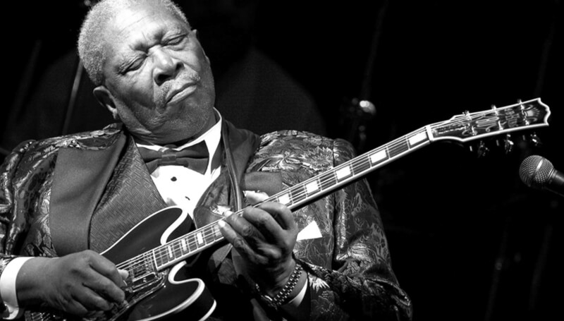 BB King playing guitar