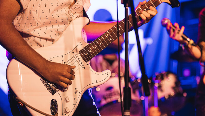 Closeup of a School of Rock student guitarist