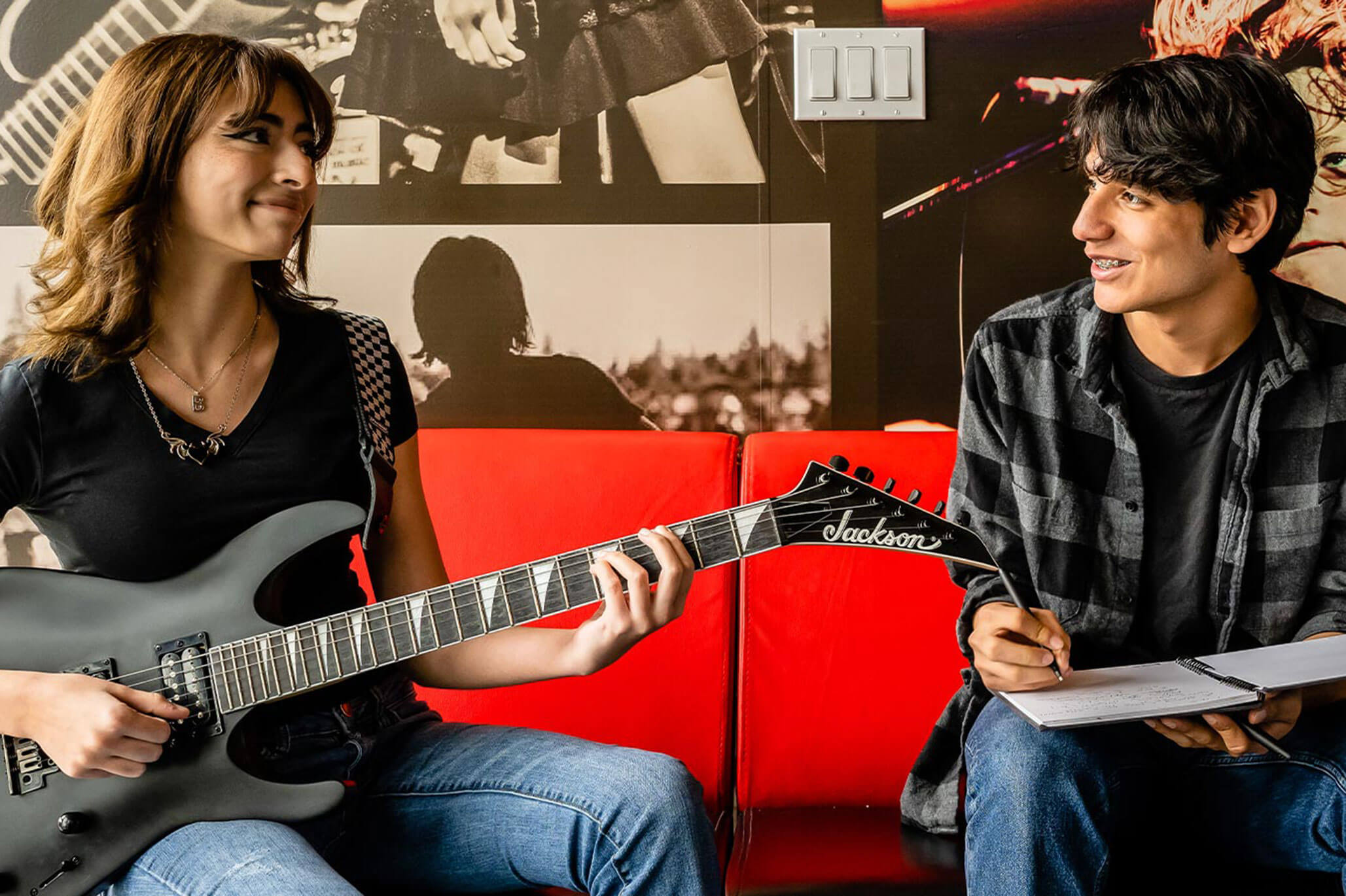 Two students writing music together